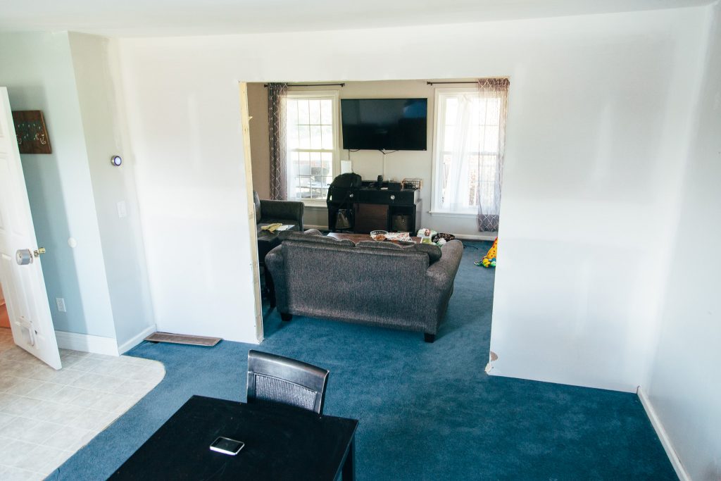 The wall between our new dining room (where the tv is in this picture) and the den (in the foreground of the picture)